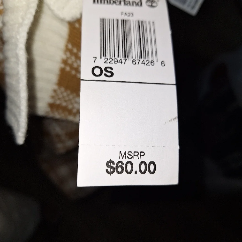 A Timberland white/ lt. brown plaid scarf that's 67